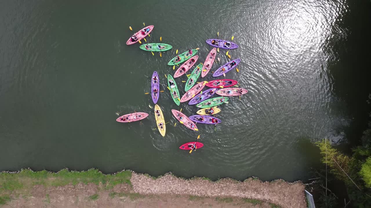 Aerial View of Colorful Kayaks on a Lake
