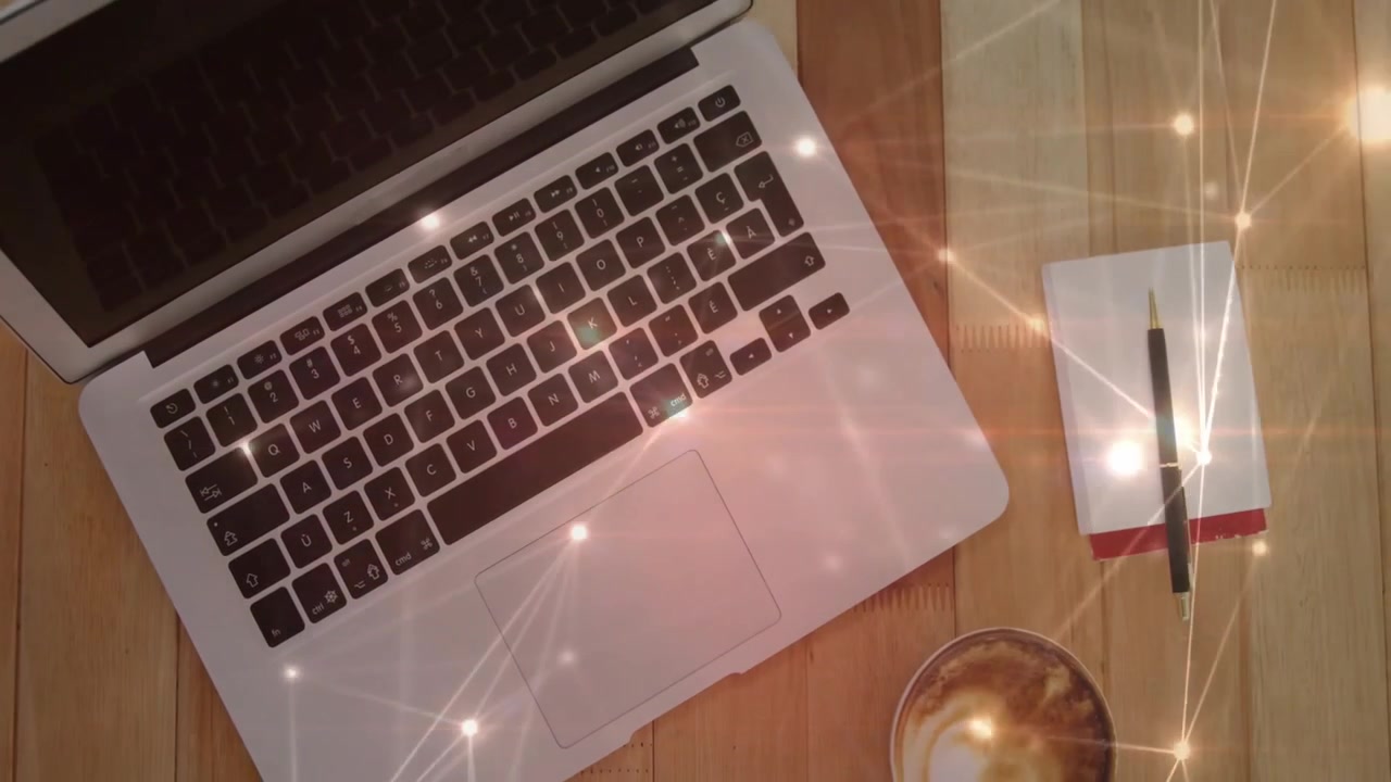 Network animation pulsing over desk showing setup laptop, notebook and pen as coffee cup entering