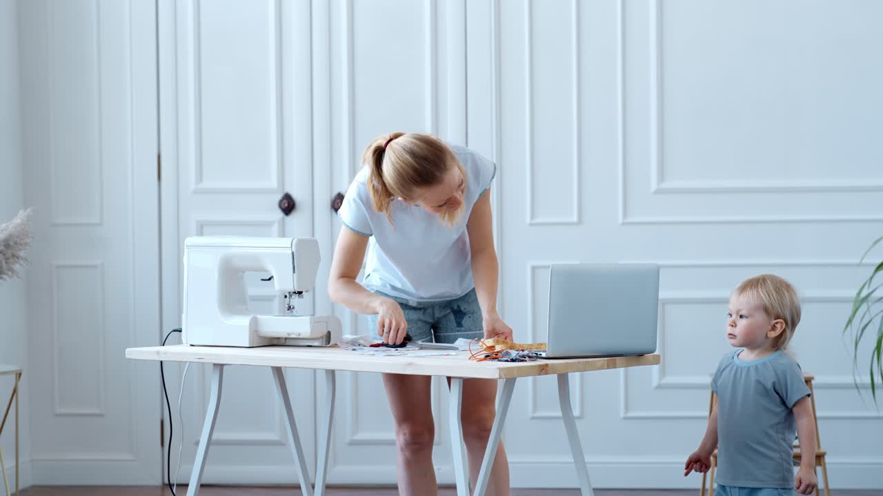 Mother and Child Sewing Together
