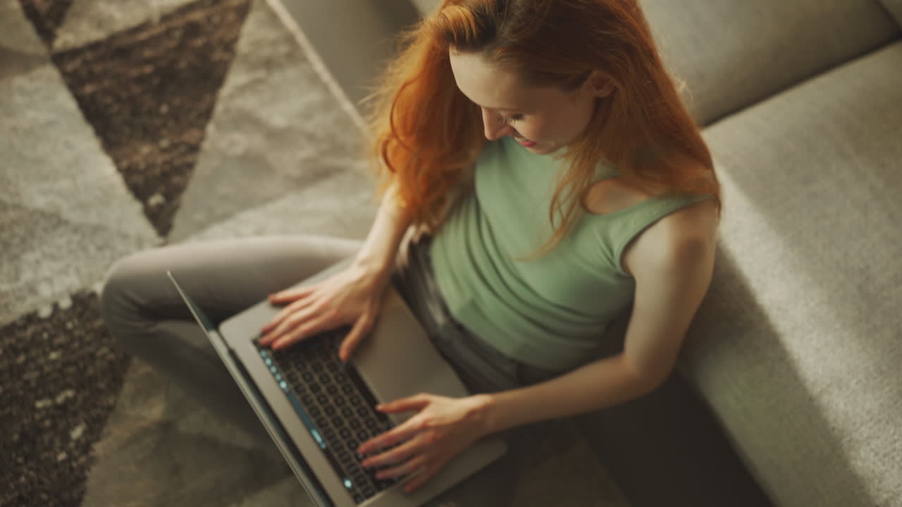 Woman working from home on laptop