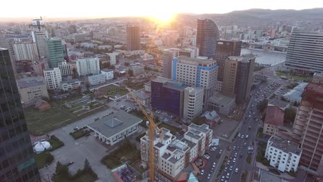 aerial drone shot of building capital mongolia facing sunset