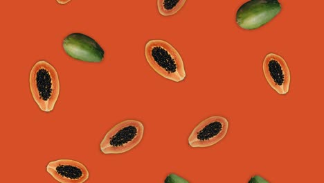 papayas caídas fondo abstracto. 4k bucle continuo. fiesta de la temporada. concepto de fruta de verano.