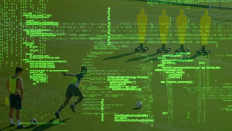 procesamiento de datos contra el jugador de fútbol masculino practicando un freekick en el campo de deportes
