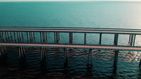 sunset aerial of lake pontchartrain causeway, louisiana – scenic twin-span bridge crossing