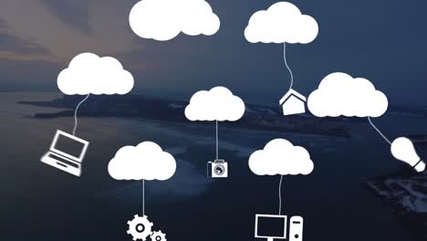 Animation-of-digital-clouds-with-icons-over-landscape