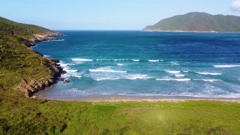 Aerial-Drone-Fly-Above-Blue-Sea-Waves-Coastal-Landscape-Beach-in-Colombian-Park,-National-Tayrona