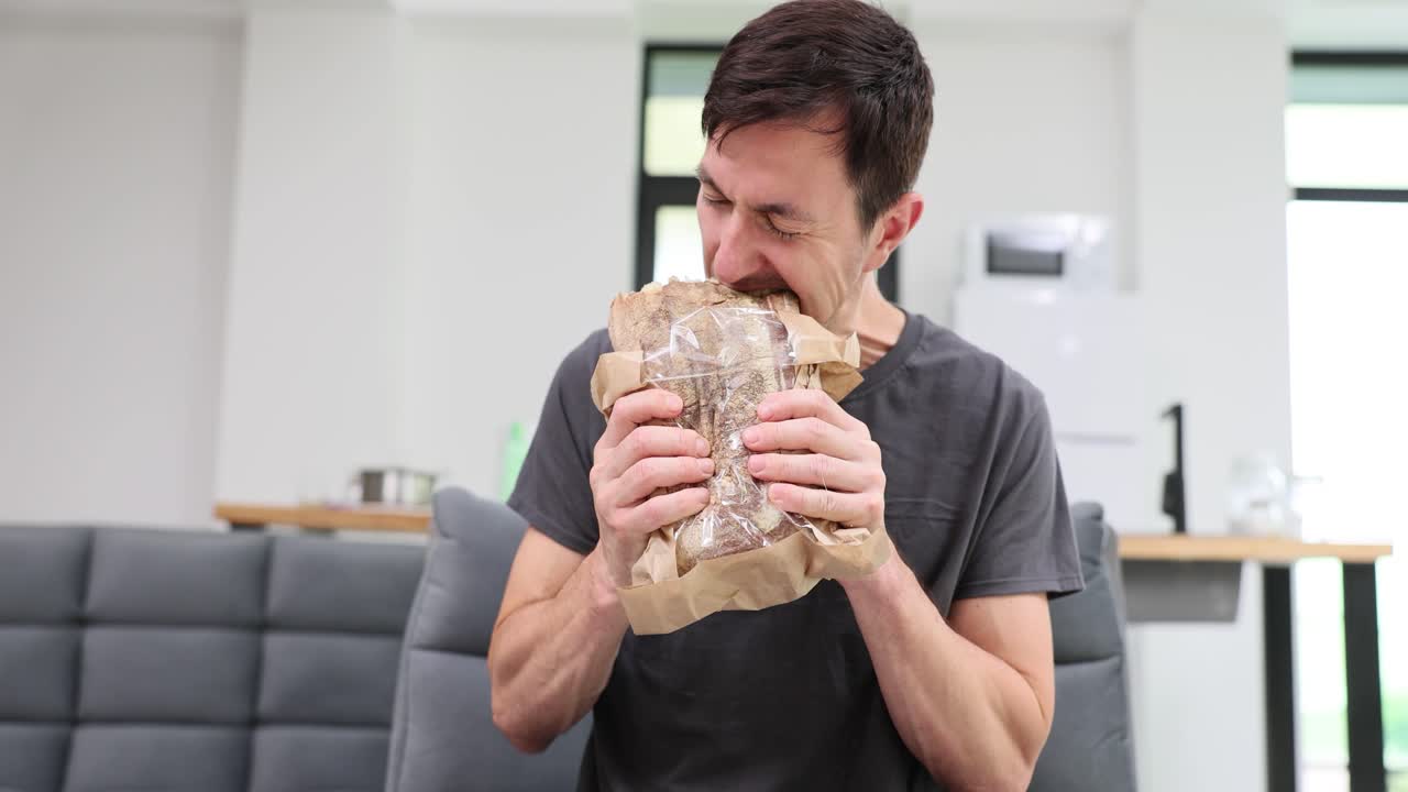 Man eating a sandwich