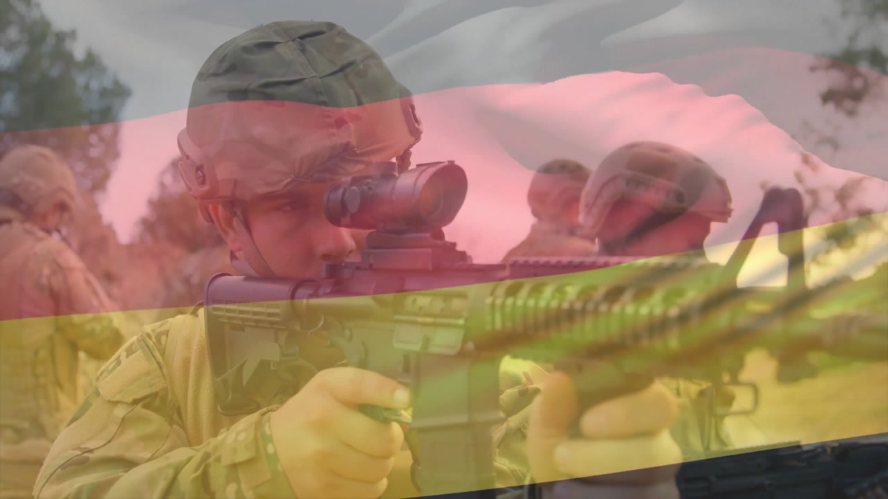male soldier adjusting rifle and tracking moving target with reticle during military training