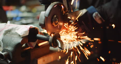 grinding metal with sander at metal industry factory 3