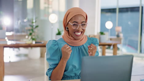 Excited-muslim-woman,-laptop