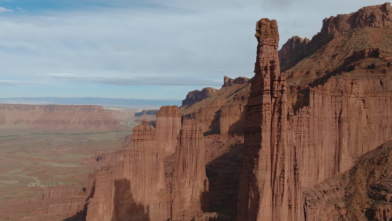 Aerial view of Moab's Fisher Towers highlighting striking red rock formations