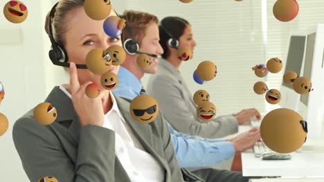 animation of emoji falling over business people wearing phone headsets