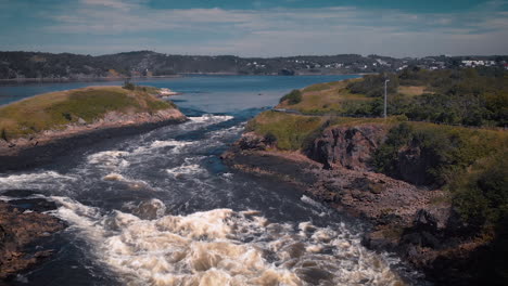 flying a drone over reverse falls in new brunswick, canada