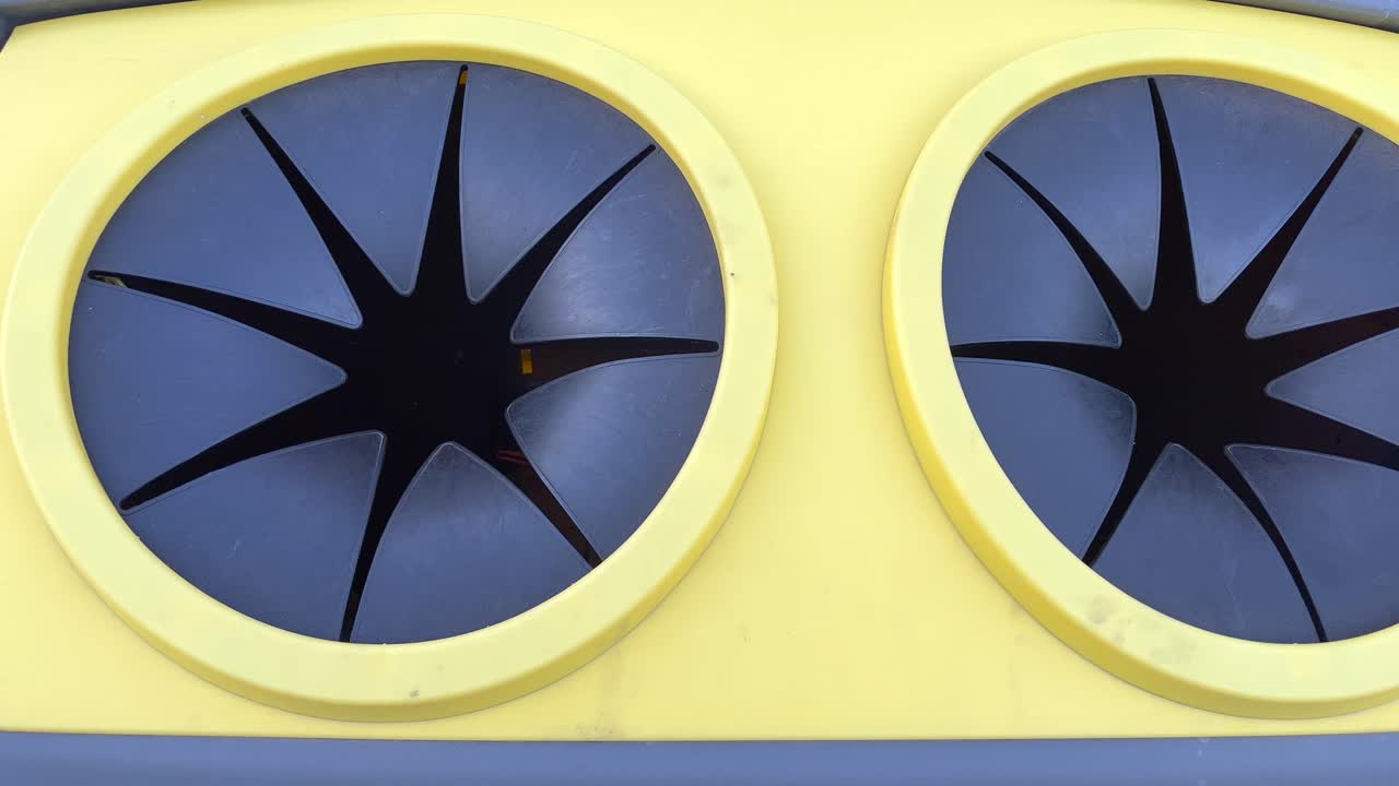 inlet of Yellow recycling bin for plastic