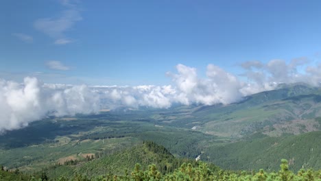 Beautiful-View-of-High-Tatras-Mountain-With-Cloudy-Blue-Sky-On-a-Sunny-Day-in-Slovakia---Aerial-shot