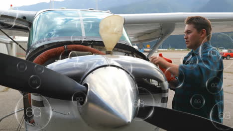 man fueling small airplane with 6g network technology animation over propeller