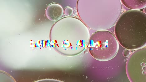 Animation-of-mega-sale-text-over-close-up-of-liquid-and-baubles