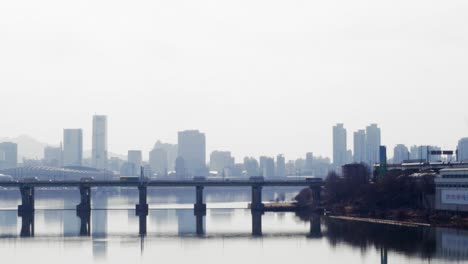 jamsil bridge and han river on a misty winter afternoon in seoul, south korea