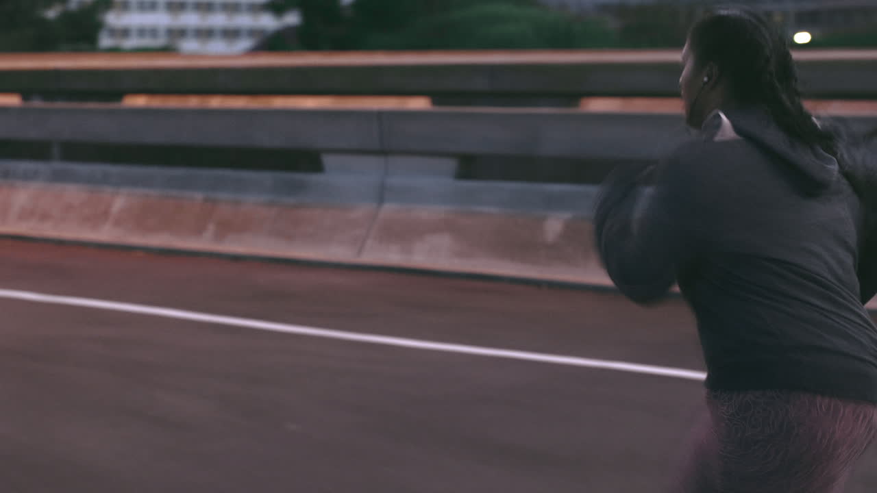 Fitness, night and black woman running in the city