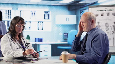 vertical video female doctor providing expert advice to cure a migraine during checkup