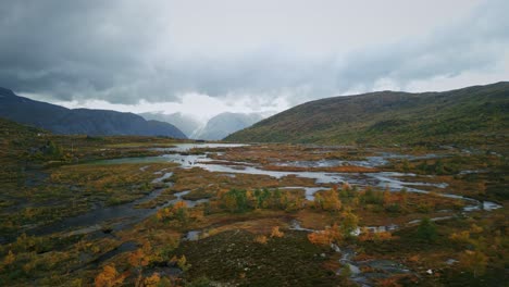 Drone-launched-from-the-ground-from-a-Norwegian-plateau-with-a-view-of-the-Norwegian-mountains