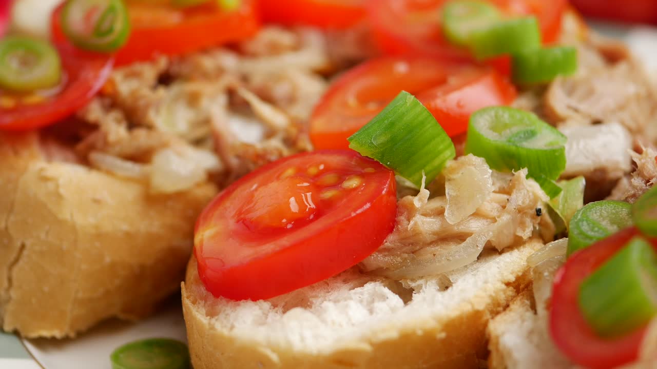 Bruschetta with tuna, tomato, and green onion