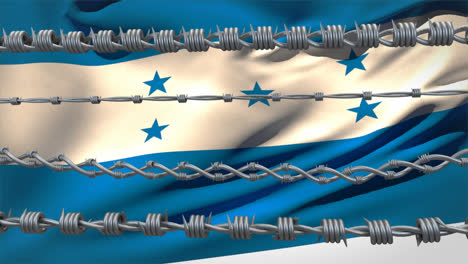 alambre de púas contra la bandera de honduras