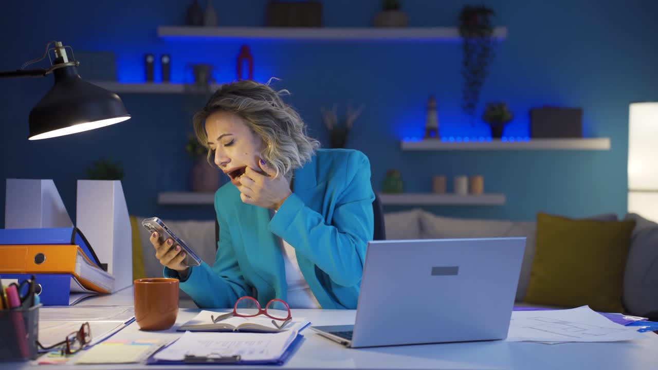 Home office worker woman teeth aches and pains.