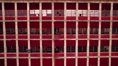 Red-abandoned-building-with-a-strong-symmetry-and-pattern