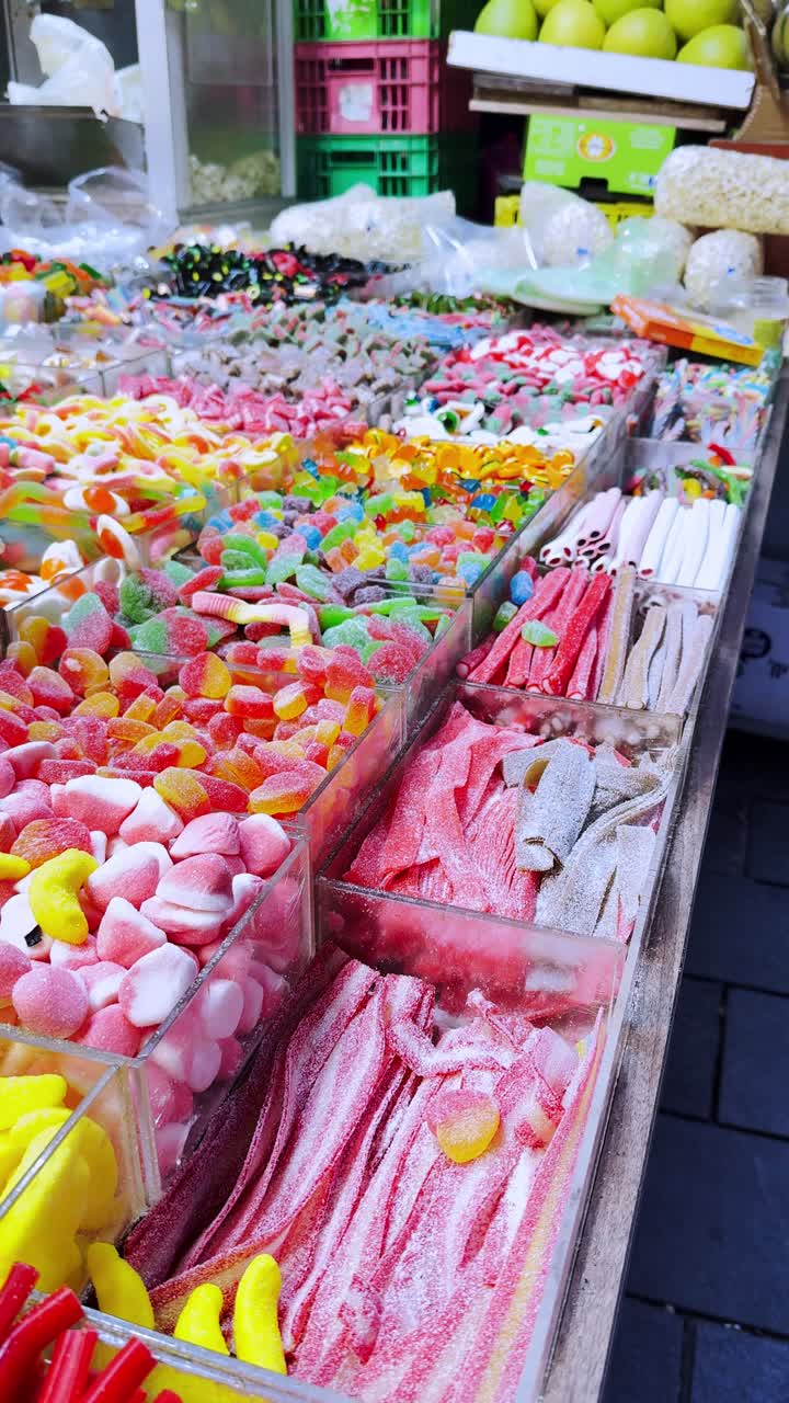 Colorful candy stall in an open air market in jerusalem