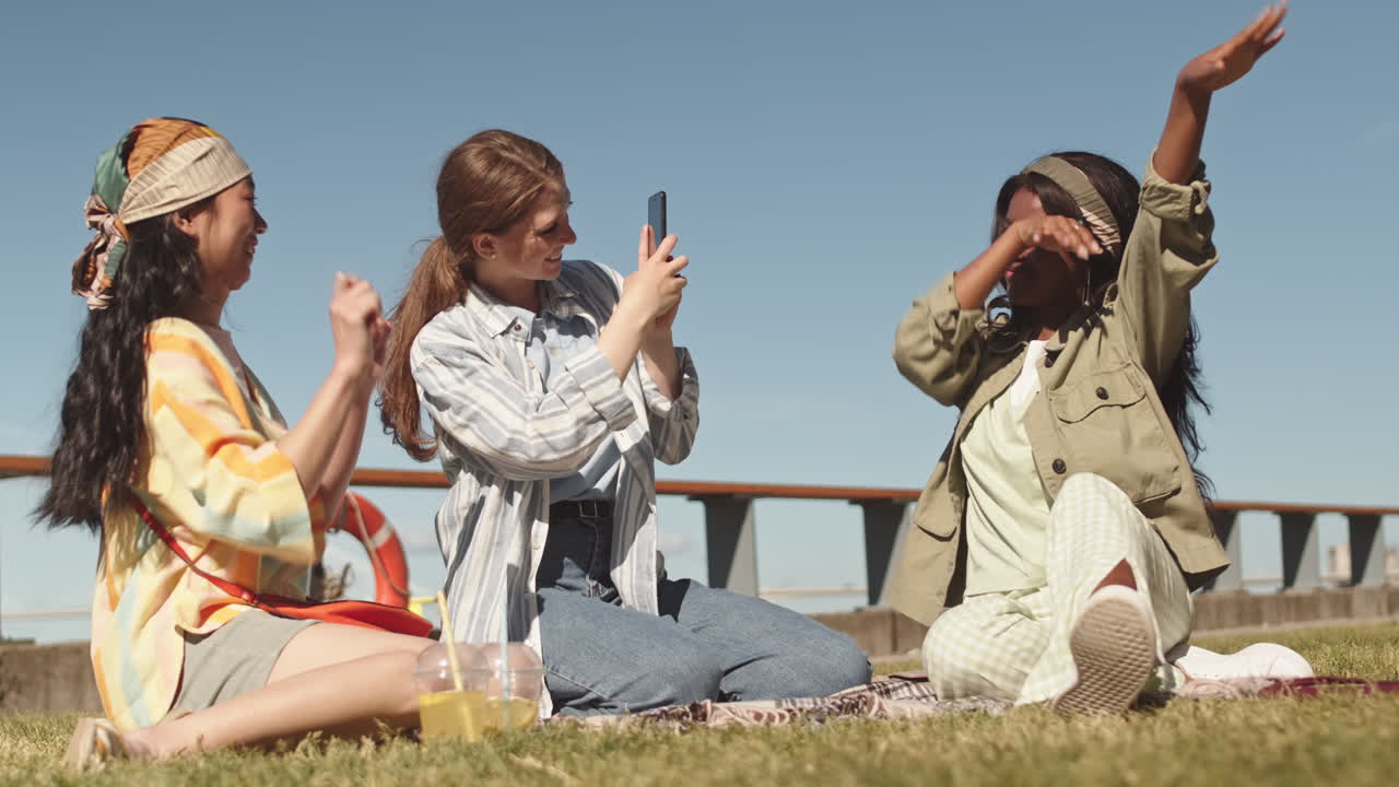 Girls Filming their Friend Dancing on Camera