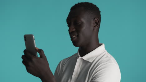 African-american-man-on-blue-background.