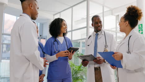 Healthcare,-tablet-and-a-nurse-talking-to-her-team