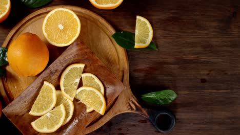 slices of ripe orange falling on the plate.