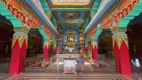 wide view of buddha statue inside of the buddhasikkhalay monastery at bodhgaya in bihar northeast india