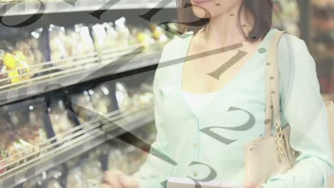 clock ticking against woman shopping in grocery store