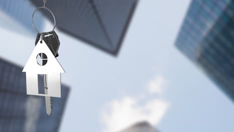 animation of silver key and house over blurred modern buildings