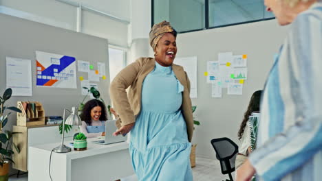 happy woman celebrating in office