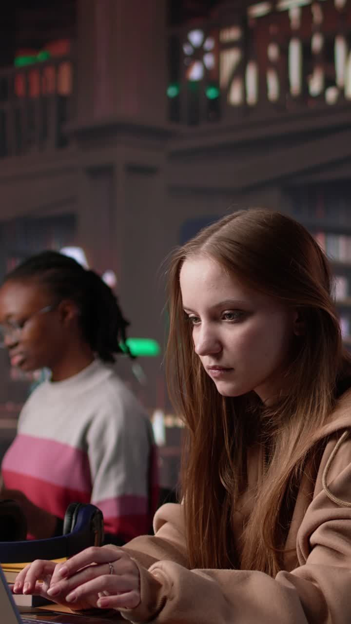 Vertical video young scholar celebrating some good news and feeling pleased with progress