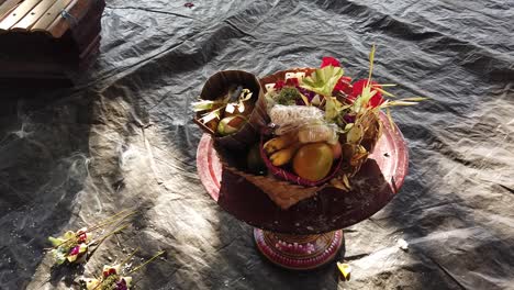 nyepi bali day of silence offerings display flowers fruit sage hindu religious celebration with beautiful colorful closeup view