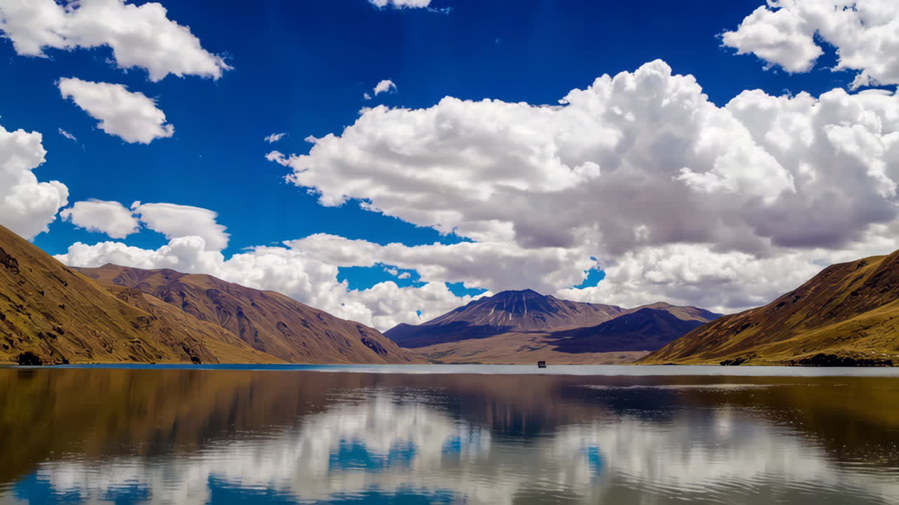 Mountain Lake with Clouds and Reflections