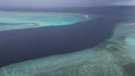aerial footage of storm approaching maldives island in the indian ocean during monsoon rainy season