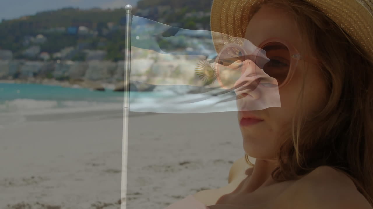Relaxing on beach, woman with Argentina flag animation waving over face