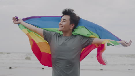 Man-with-rainbow-flag