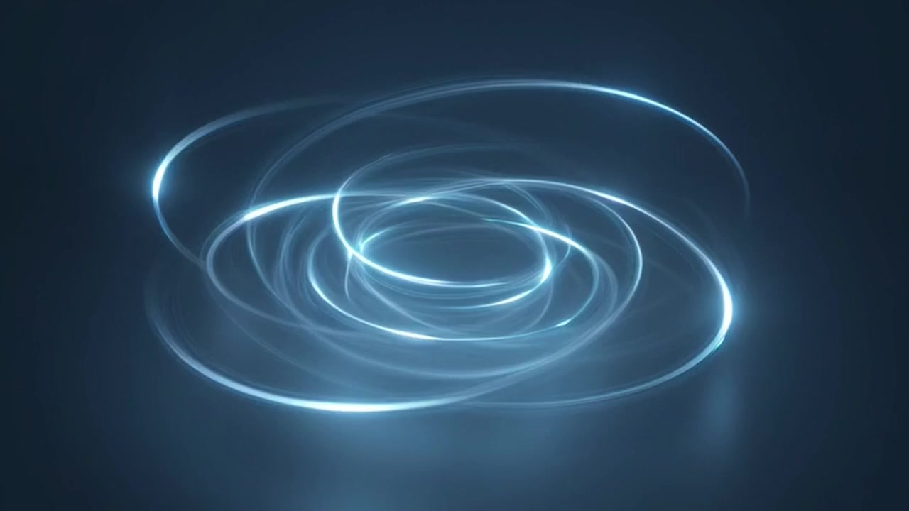 Anelli astratti di luce blu luminosa che ruotano nello spazio buio.