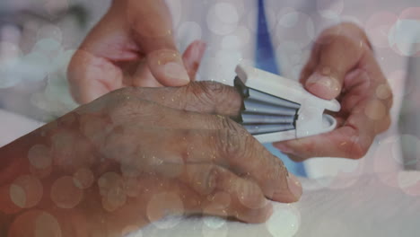 animación de puntos de luz sobre el médico caucásico que trata al paciente.