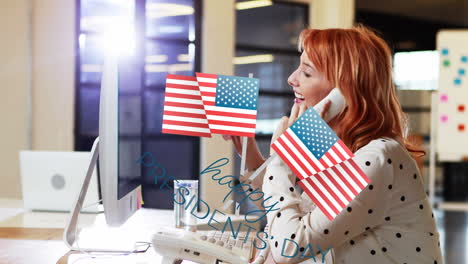 animation of happy presidents day text over caucasian businesswoman on phone in office