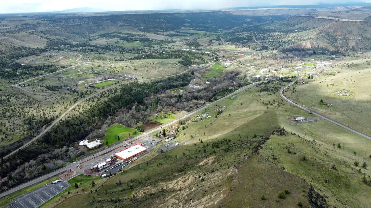 US, Oregon, Warm Springs, , 2025-04-07 - Drone view of the city of Warm Springs on the Confederated Tribes of Warm Springs in spring. The casino is on the bottom and the city in the valley