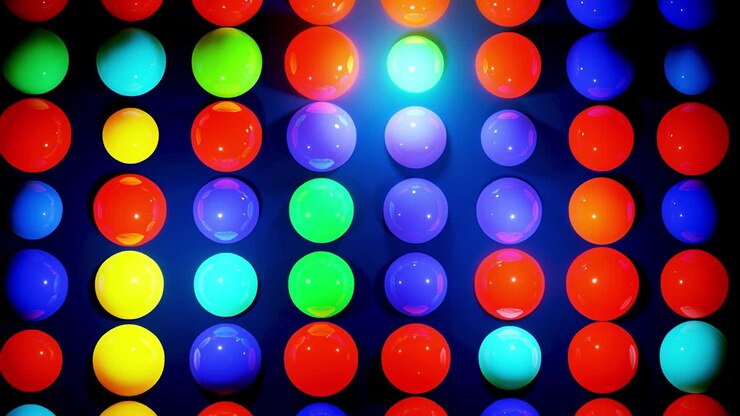 Abstract composition of colorful balls in plane, which randomly light up and reflect in each other. Multicolored spheres like leds as simple geometric dark background with light effects.