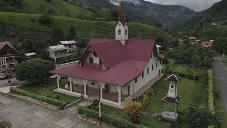 rising aerial of quaint iglesia de prusia church in remote peru valley